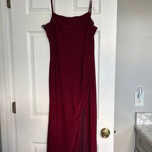 The long burgundy dress spilled out from the side
